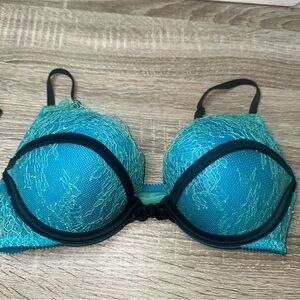 Victoria’s Secret Bombshell Plunge  32A. Makes you look 2 sizes bigger .